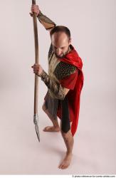 Man Adult Average White Fighting with spear Standing poses Casual